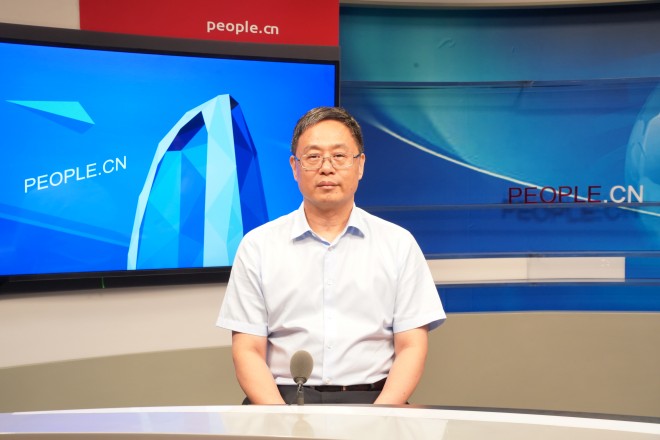 中國藝術研究院院長、黨委副書記周慶富做客人民網。張力洋攝